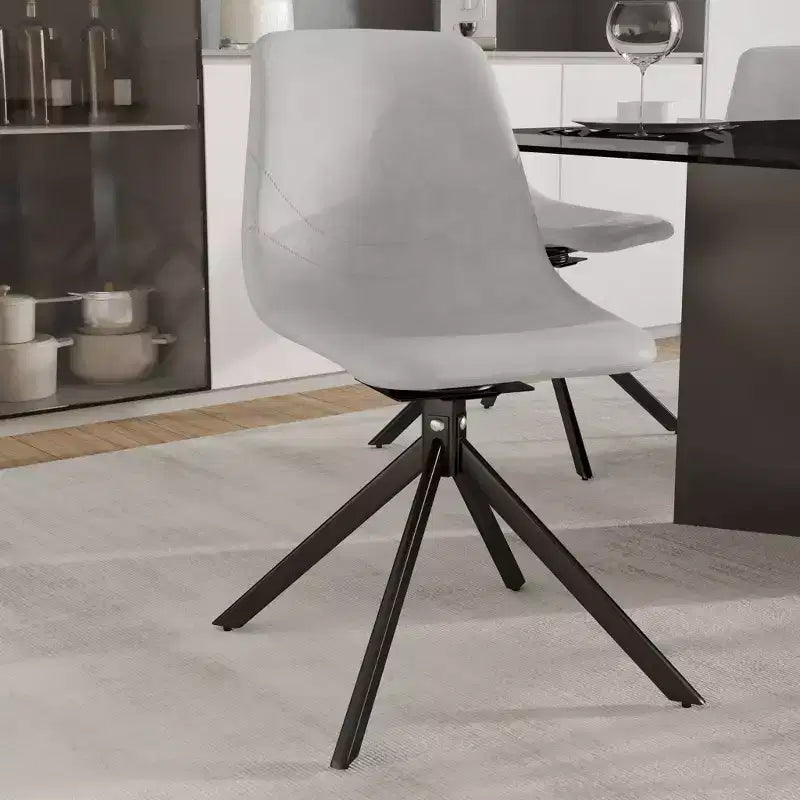 LeisureMod Leather Dining Chair with 360-Degree Swivel And Powder-Coated Iron Legs